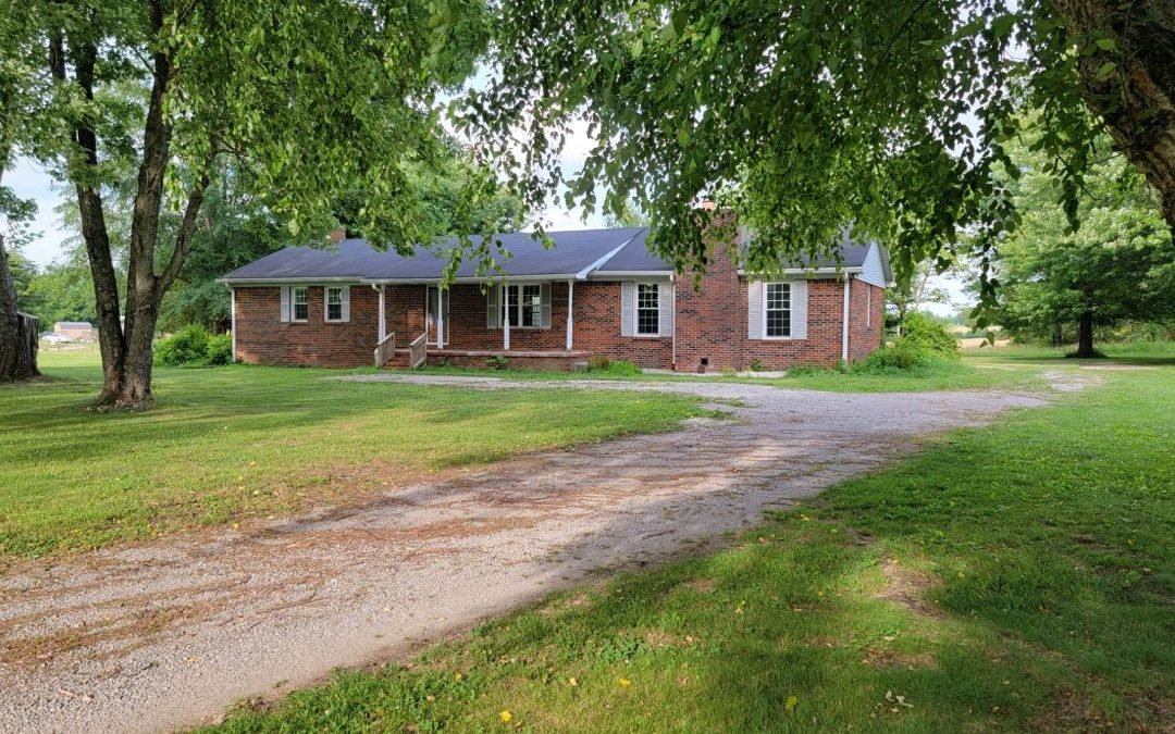 Brick Home & 1.52+/- Acres • Basement • Detached Garage