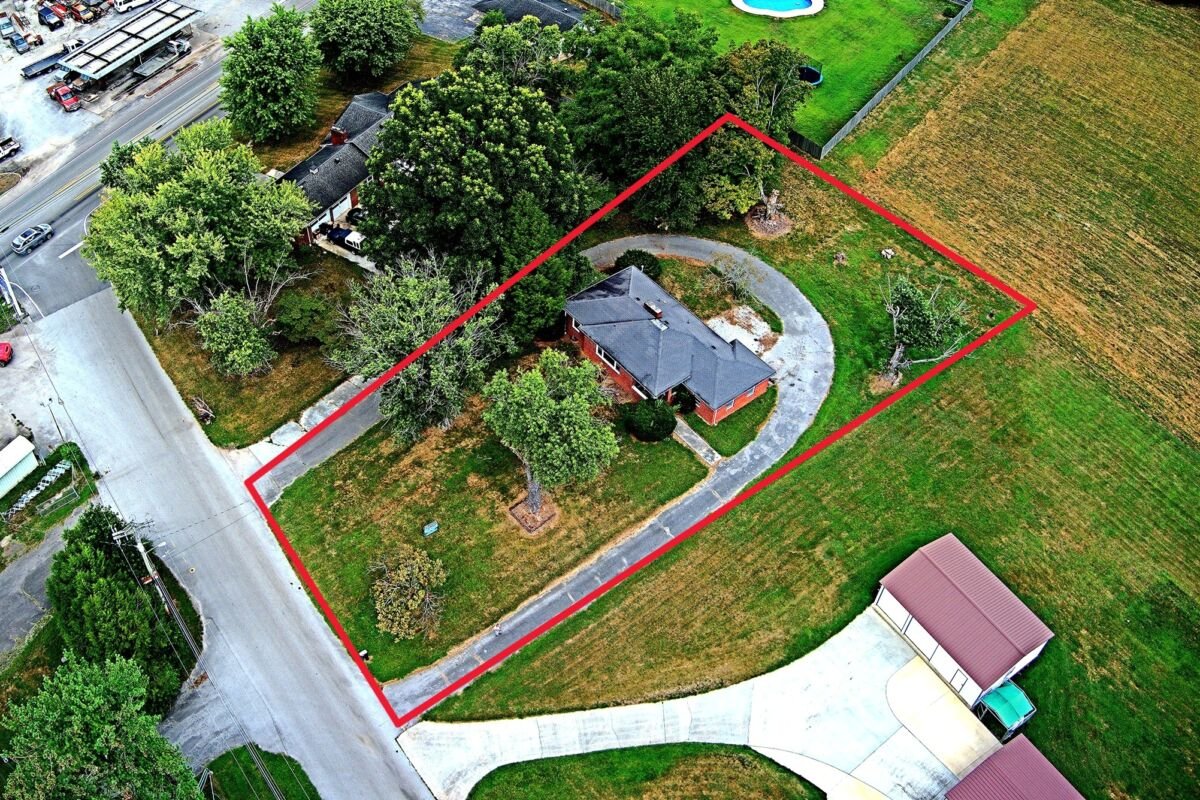Brick Home & Lot • Basement • Paved Drive • Attached Garage • Chancery Court Auction