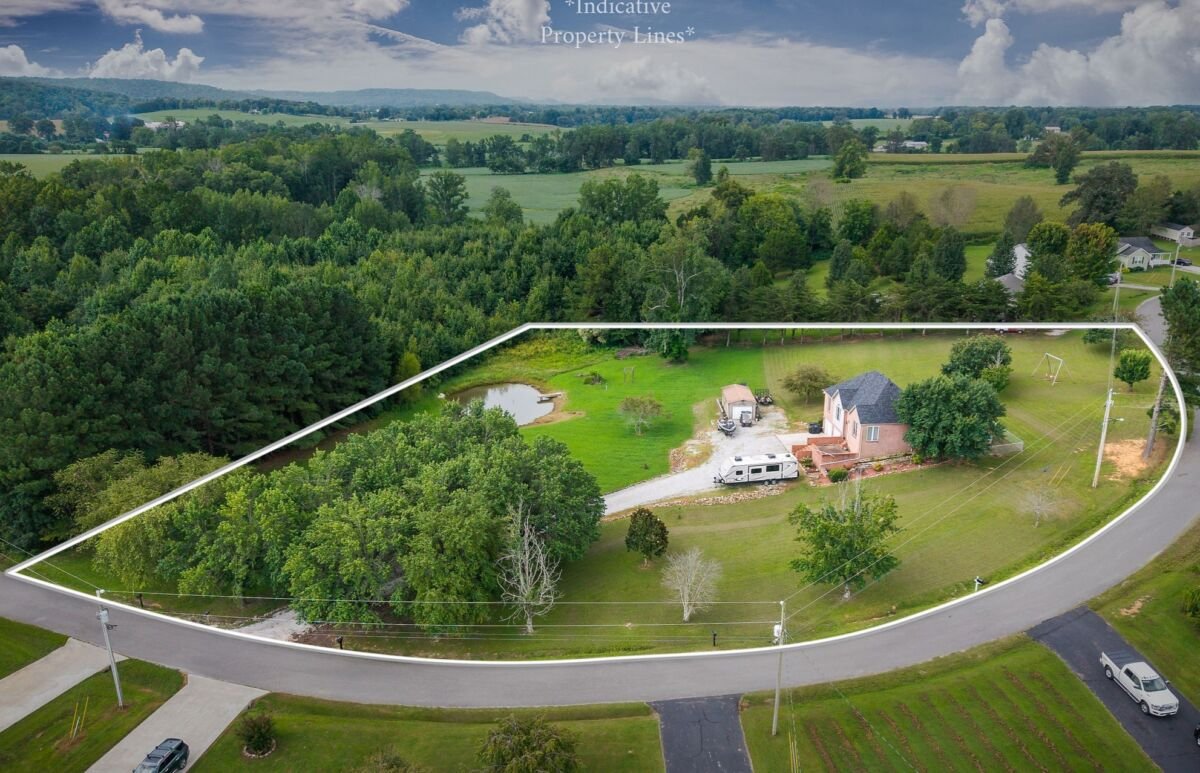 Brick Home & 2.45+/- Acres • Basement • Landscaped • Pond